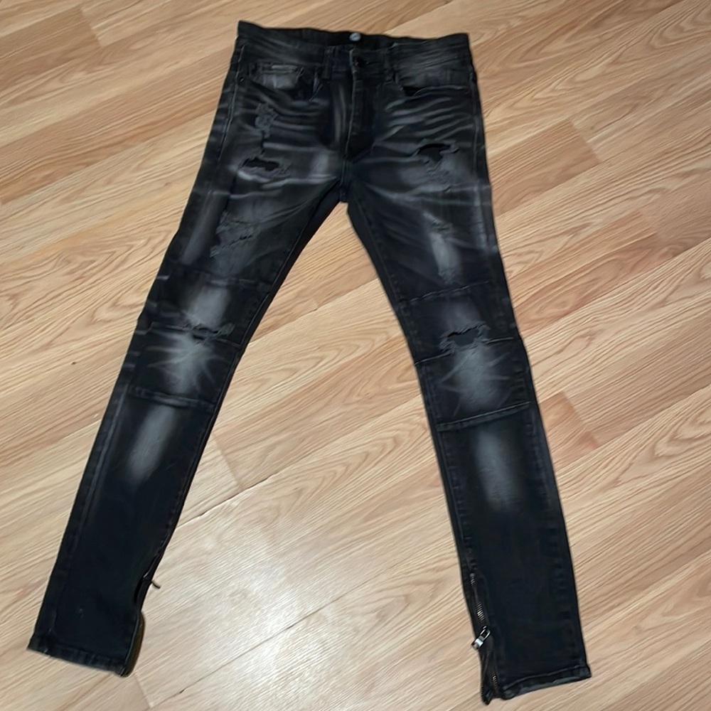 Black with a tint of grey Jordan Craig ripped jeans. Size 32/32.